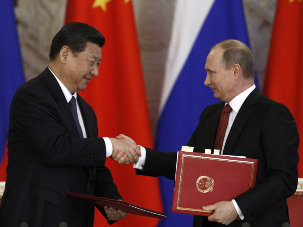 Russia-and-Chinas-presidents-take-a-photo-